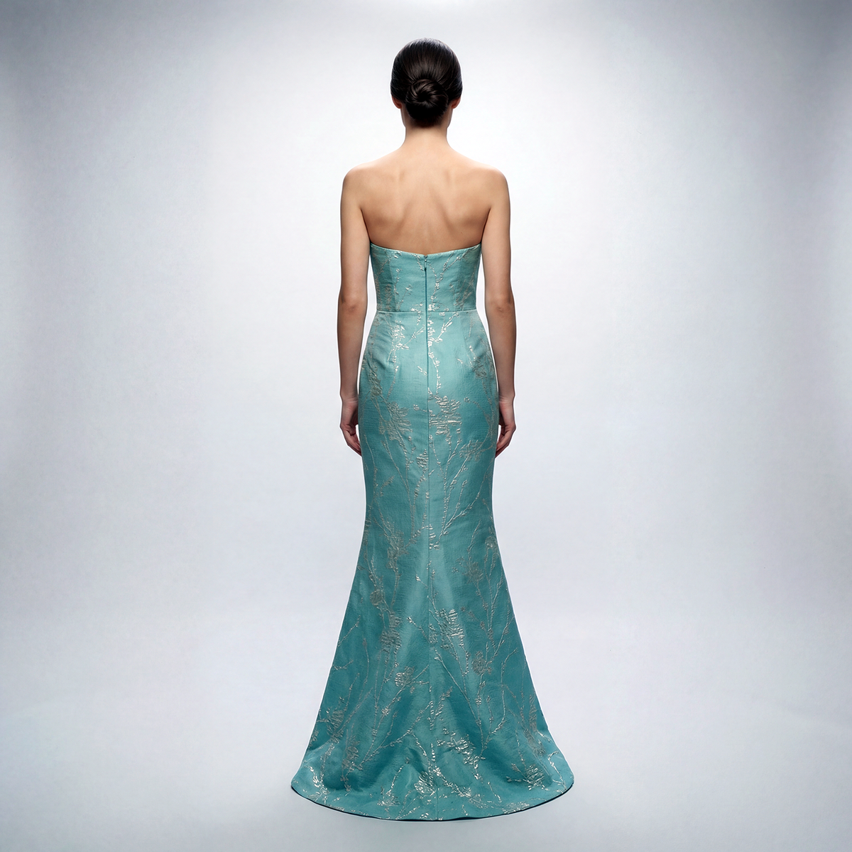 Shop our NYC-made Aqua Blue Brocade Trumpet Gown.